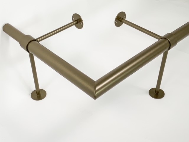 Hoekstuk voor voetrail in brons