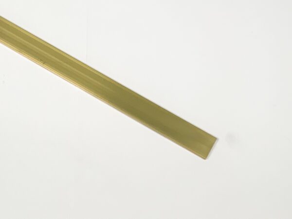 Strip in messing